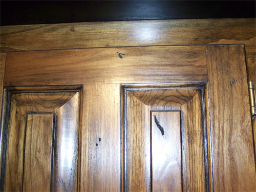 cabinets are distressed and a black gel is added in North Richland Hills
